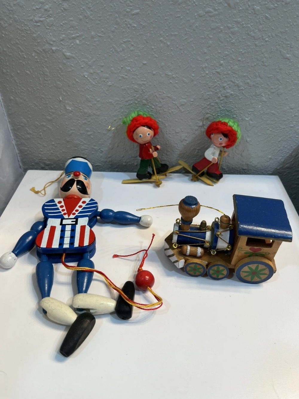 Lot Of 4 VTG Wooden Christmas Ornaments Train Skiers & Pull String Nutcracker